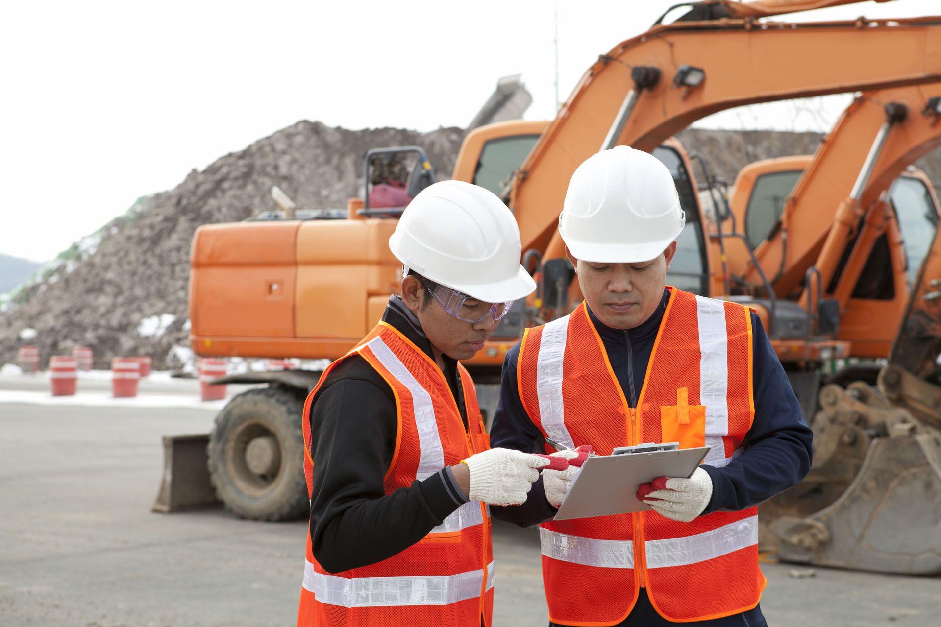 Un aide conducteur de travaux sur un chantier